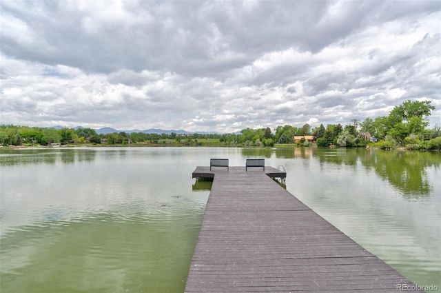 a view of a lake with a floor to ceiling