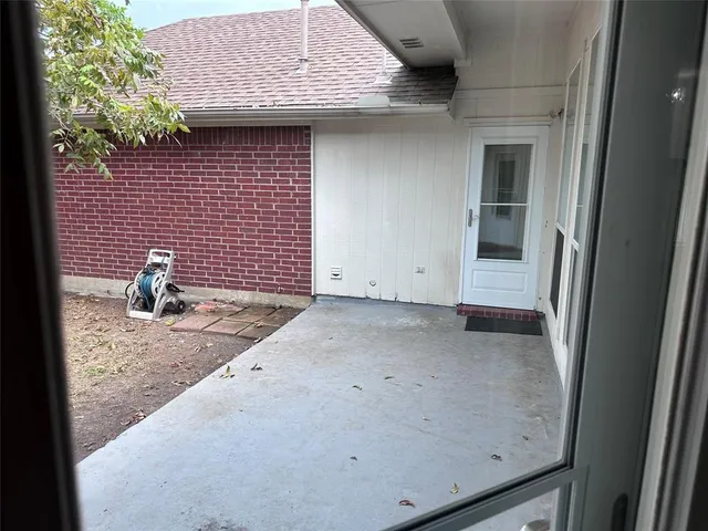 a view of a backyard of a house