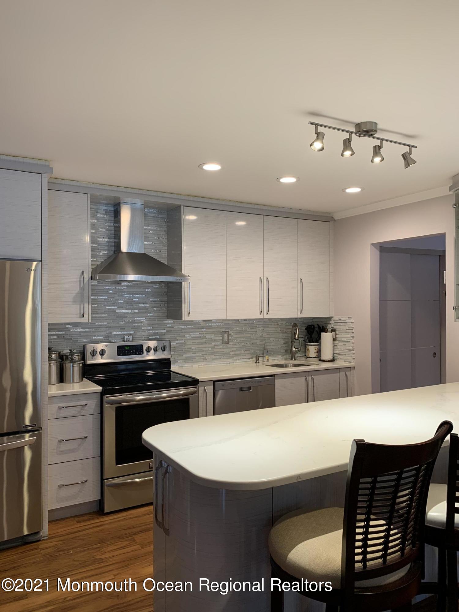 98 Arrowood Road, Unit J Manalapan, NJ 07726 - Photo 1 of 18 IMG_1470