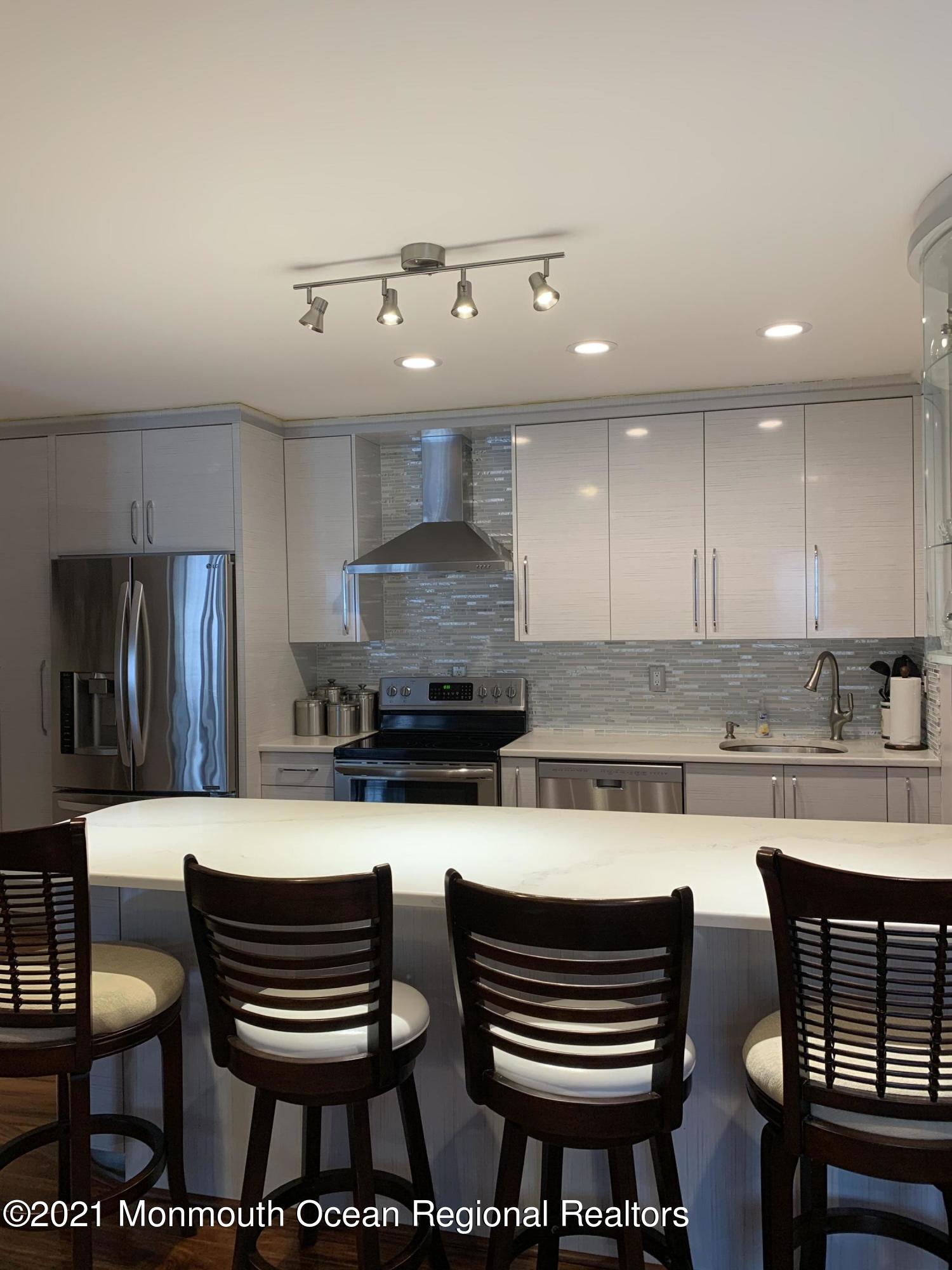 98 Arrowood Road, Unit J Manalapan, NJ 07726 - Photo 3 of 18 IMG_1469