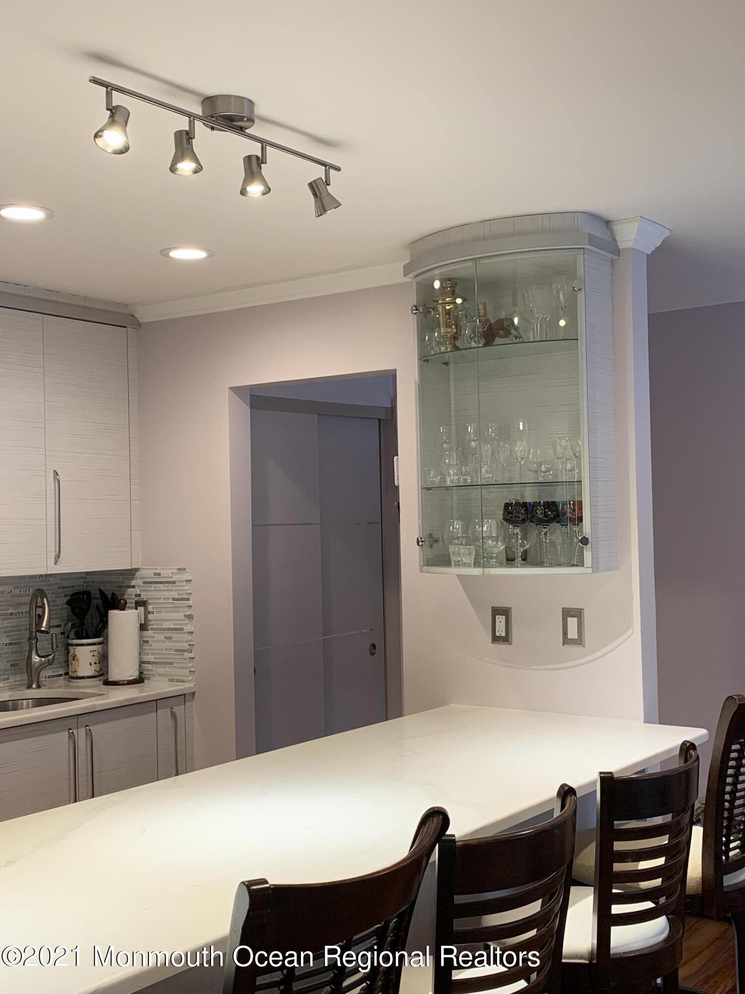 98 Arrowood Road, Unit J Manalapan, NJ 07726 - Photo 4 of 18 IMG_1471