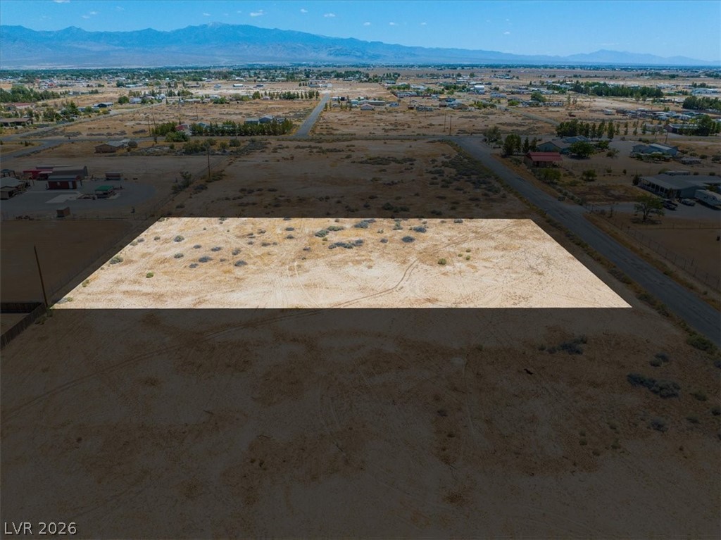 4610 Lawrence Road Pahrump, NV 89048 - Photo 29 of 42 A spacious, buildable parcel with distant mountains and nearby community amenities.