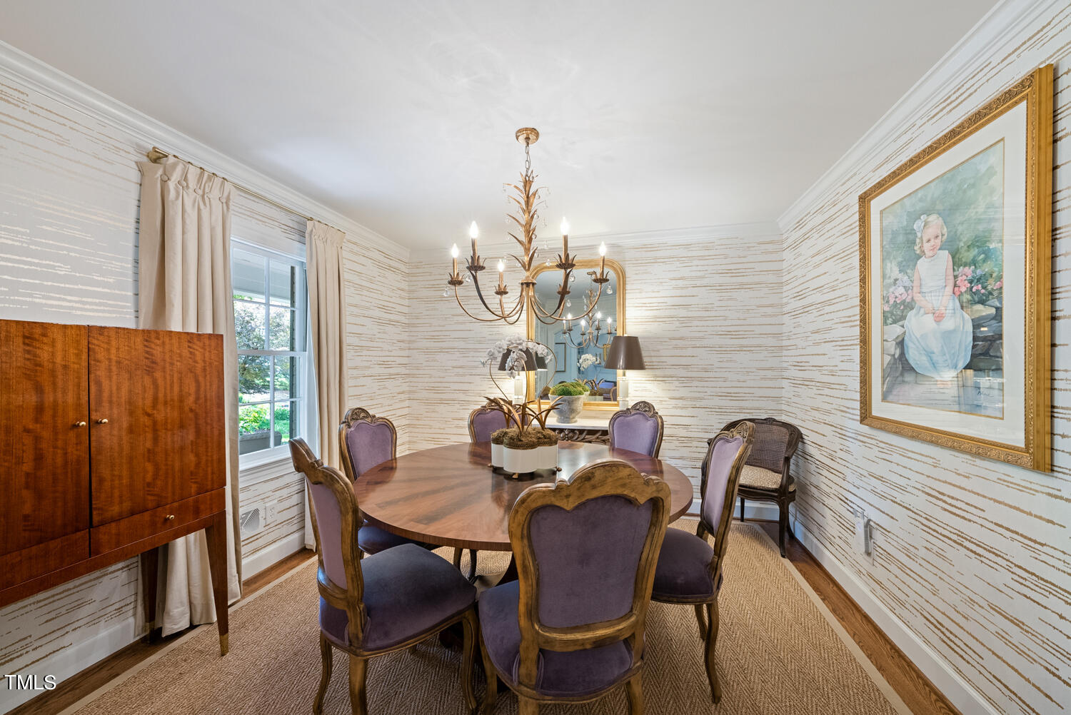 2421 Tyson Street Raleigh, NC 27612 - Photo 12 of 61 a dining room with furniture a chandelier and wooden floor