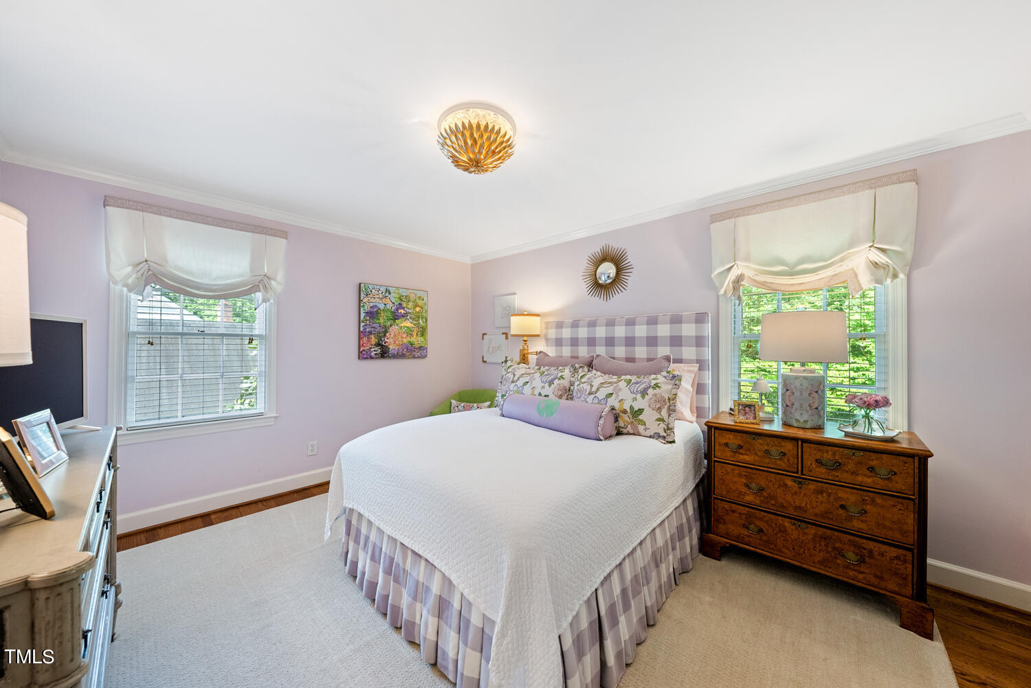 2421 Tyson Street Raleigh, NC 27612 - Photo 28 of 61 a bedroom with a bed and a window