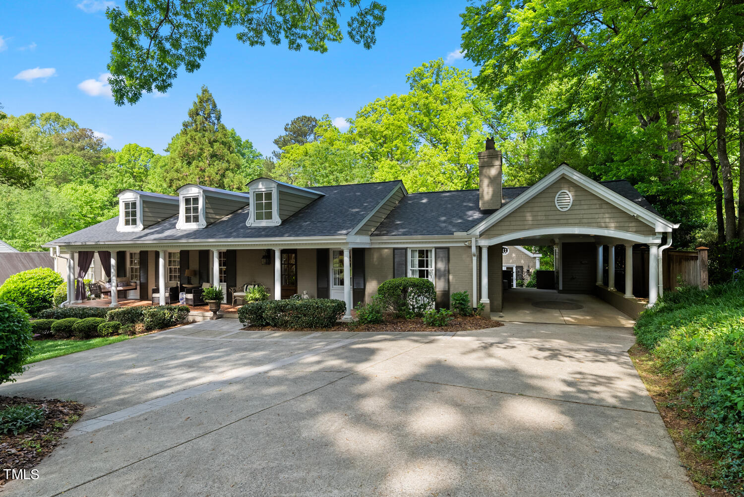 2421 Tyson Street Raleigh, NC 27612 - Photo 3 of 61 a front view of a house with a garden