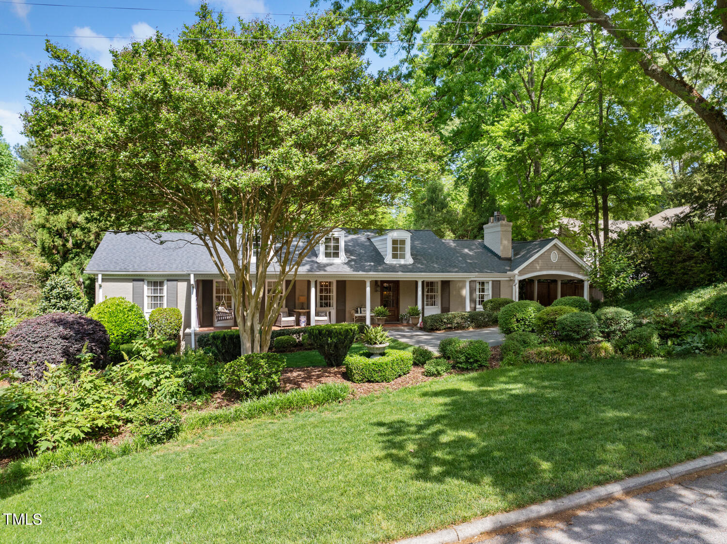 2421 Tyson Street Raleigh, NC 27612 - Photo 60 of 61 a front view of a house with garden