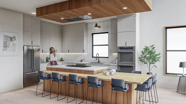 a kitchen with stainless steel appliances kitchen island granite countertop a dining table chairs and a refrigerator