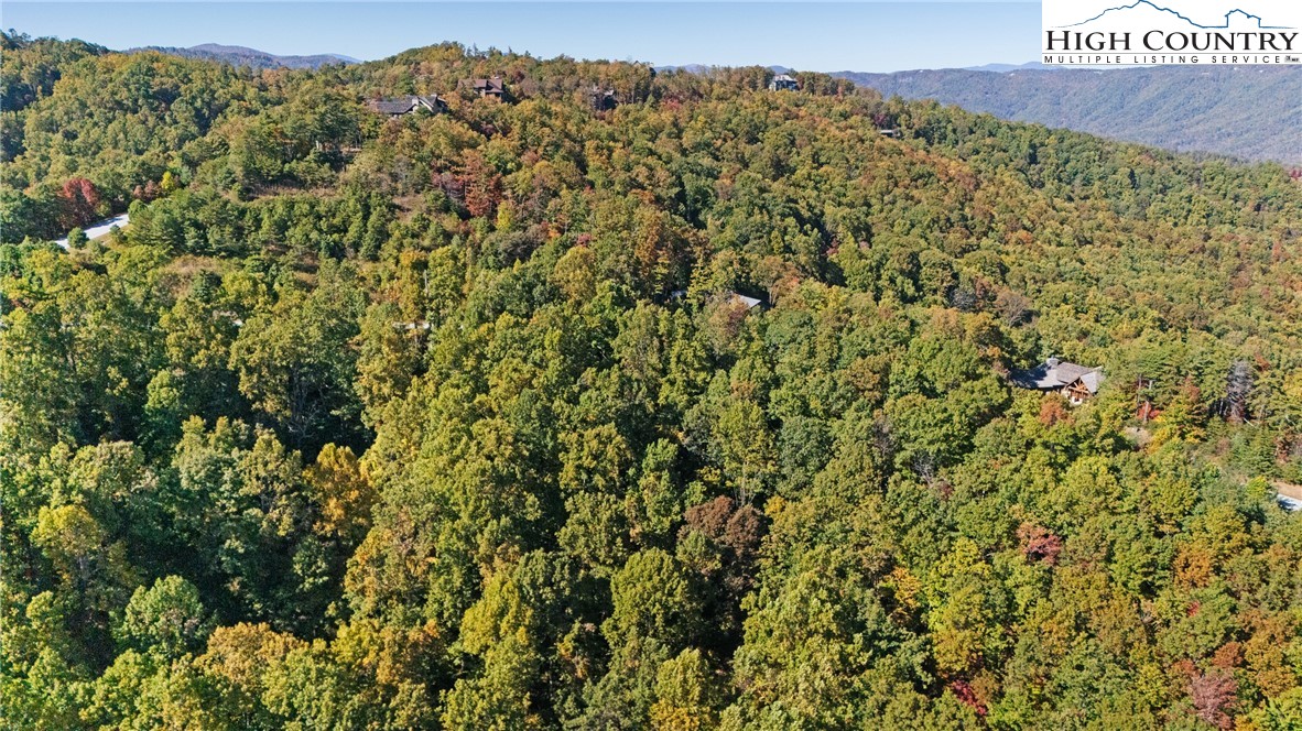 Reynolds Parkway Boone, NC 28607 - Photo 5 of 19 a view of a large building with a mountain in the background