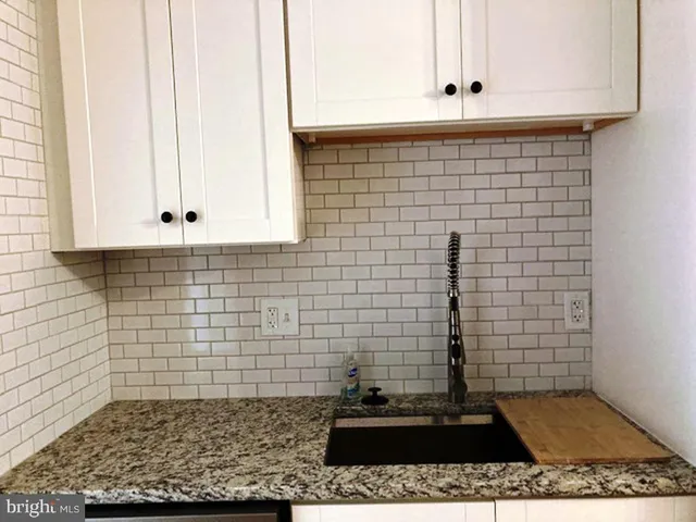 a view of a room that has a window