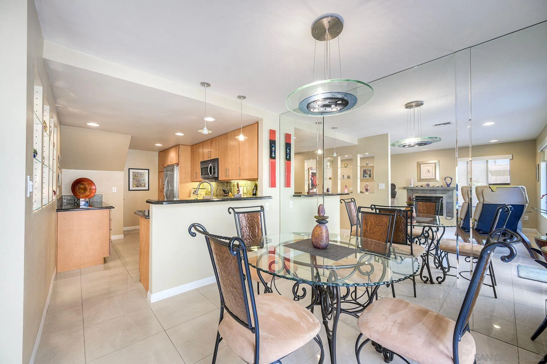 3467 Reynard Way, Unit A San Diego, CA 92103 - Photo 1 of 29 a view of a dining area with furniture and a large window