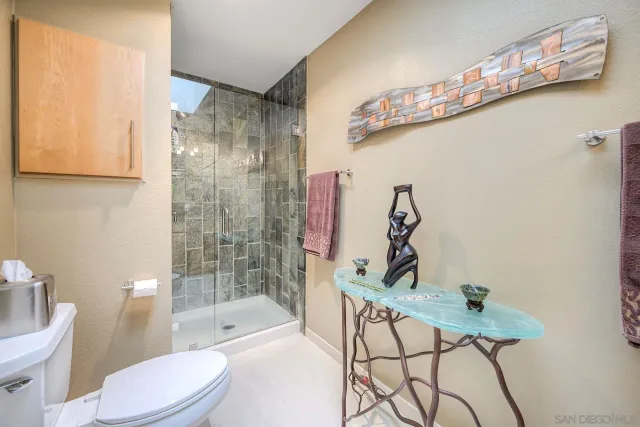 a kitchen with a sink and a granite counter tops