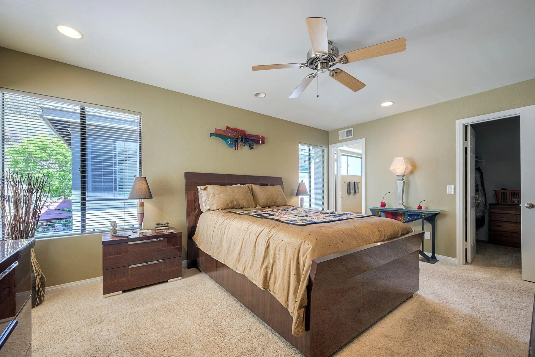 3467 Reynard Way, Unit A San Diego, CA 92103 - Photo 21 of 29 a bedroom with a bed and a couch