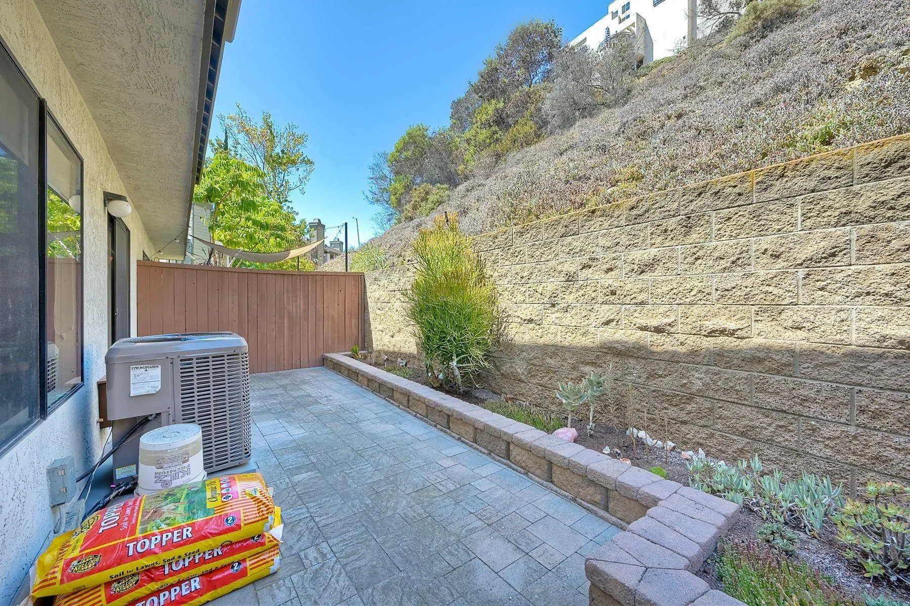 3467 Reynard Way, Unit A San Diego, CA 92103 - Photo 23 of 29 a backyard of a house with outdoor seating
