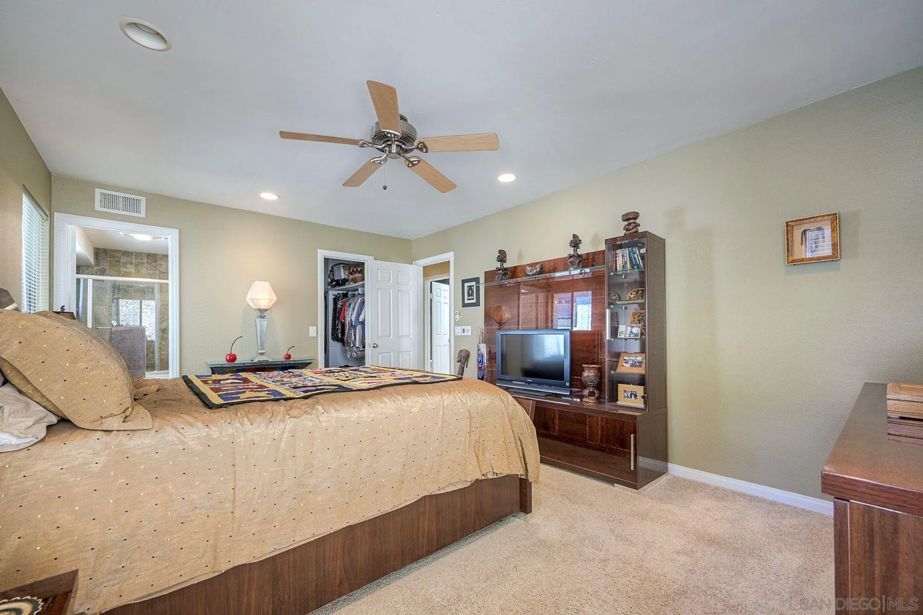 3467 Reynard Way, Unit A San Diego, CA 92103 - Photo 4 of 29 a bedroom with a bed and wooden floor