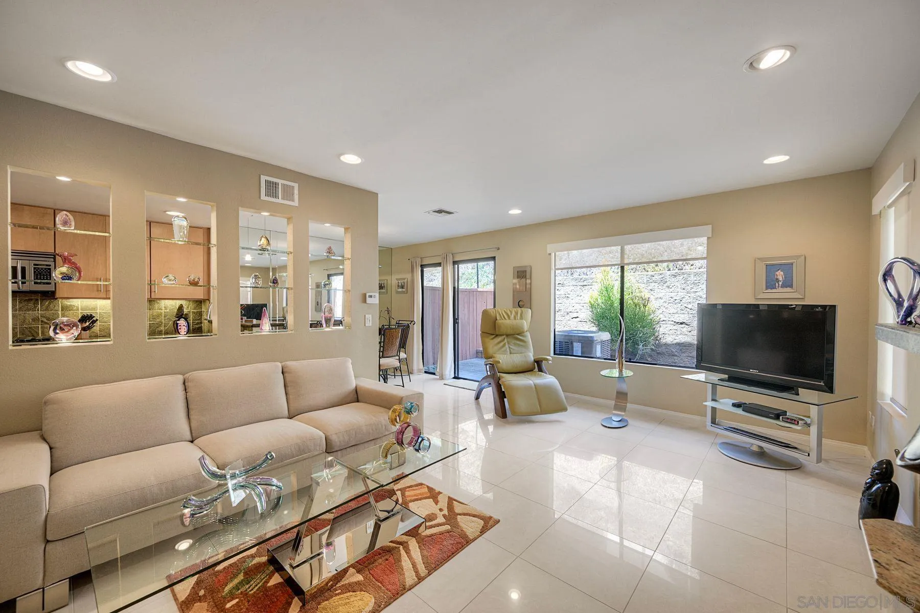 3467 Reynard Way, Unit A San Diego, CA 92103 - Photo 8 of 29 a living room with furniture and a flat screen tv