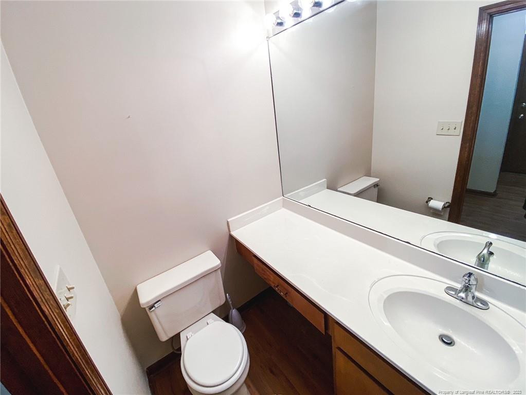 207 Charmant Road Lumberton, NC 28358 - Photo 12 of 24 a bathroom with a sink and toilet