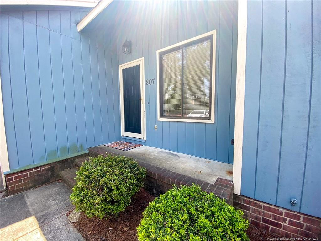 207 Charmant Road Lumberton, NC 28358 - Photo 2 of 24 a view of an entrance to house and entryway