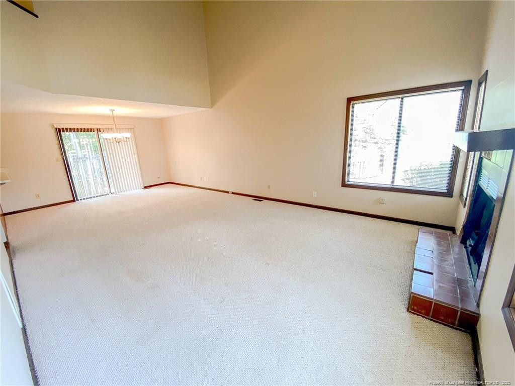 207 Charmant Road Lumberton, NC 28358 - Photo 4 of 24 a view of an empty room with a window