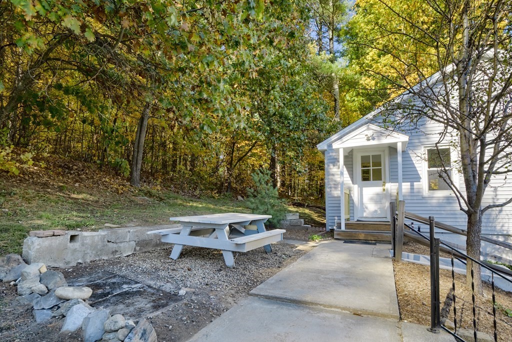 140 Leominster Road Sterling, MA 01564 - Photo 23 of 35 a view of backyard with outdoor seating and trees