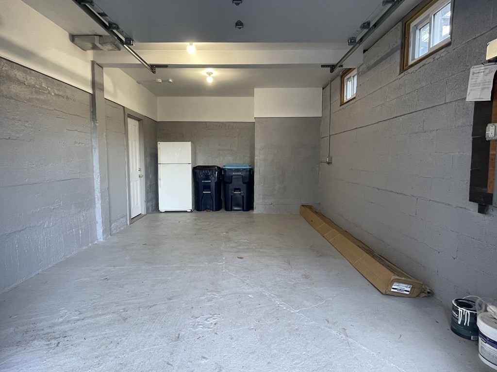 140 Leominster Road Sterling, MA 01564 - Photo 26 of 35 a view of a livingroom with an empty space and a kitchen
