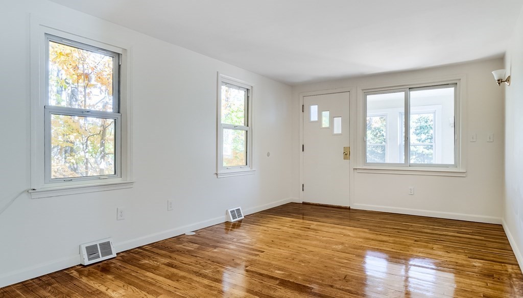 140 Leominster Road Sterling, MA 01564 - Photo 8 of 35 a view of empty room with wooden floor and fan