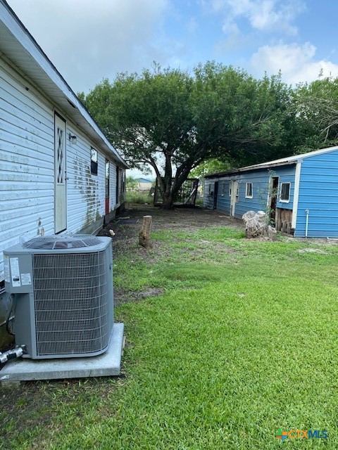 76 College Placedo, TX 77977 - Photo 12 of 17 a view of backyard of house with green space