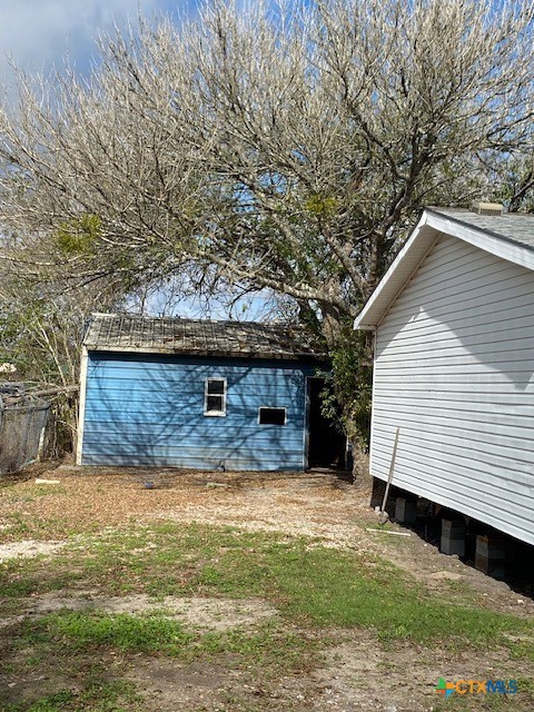 76 College Placedo, TX 77977 - Photo 14 of 17 a view of a house with a yard