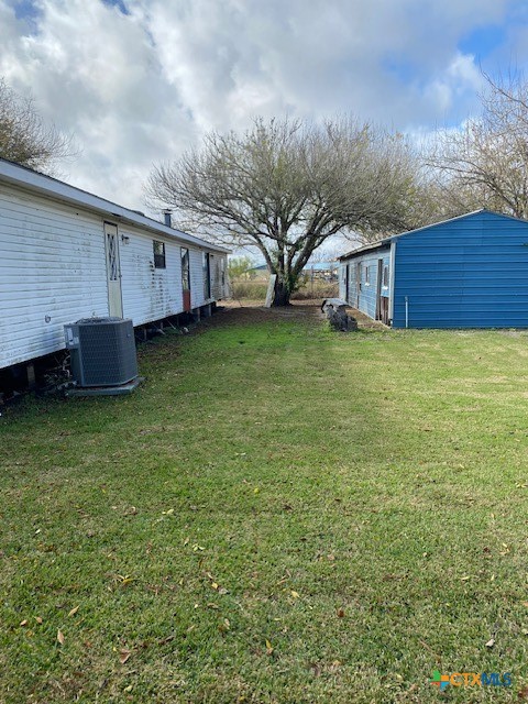 76 College Placedo, TX 77977 - Photo 15 of 17 a view of a house with a backyard