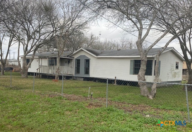 76 College Placedo, TX 77977 - Photo 2 of 17 front view of a house with a yard