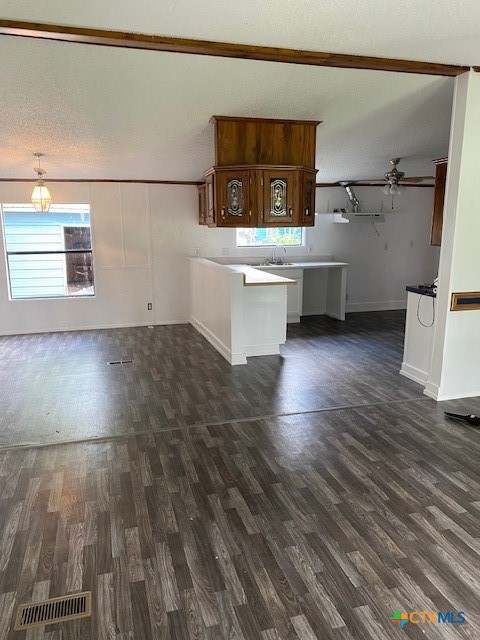 76 College Placedo, TX 77977 - Photo 4 of 17 a view of a kitchen with wooden floor and electronic appliances