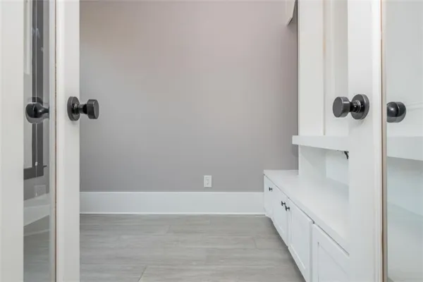 a bathroom with double vanity sinks double vanity and a shower