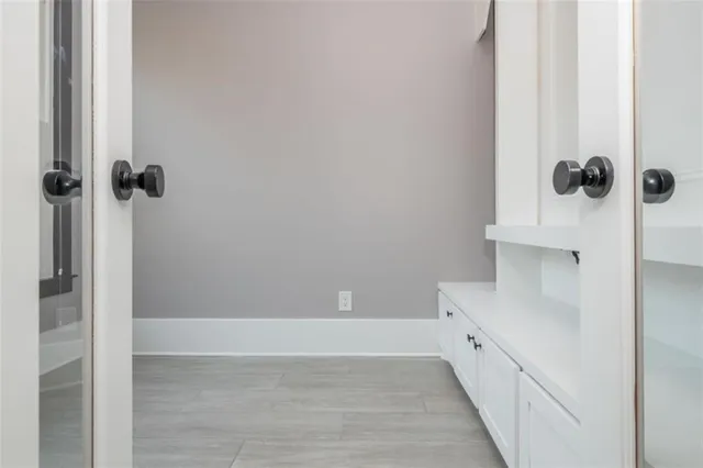 a bathroom with double vanity sinks double vanity and a shower