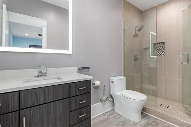 a view of an entryway with wooden floor