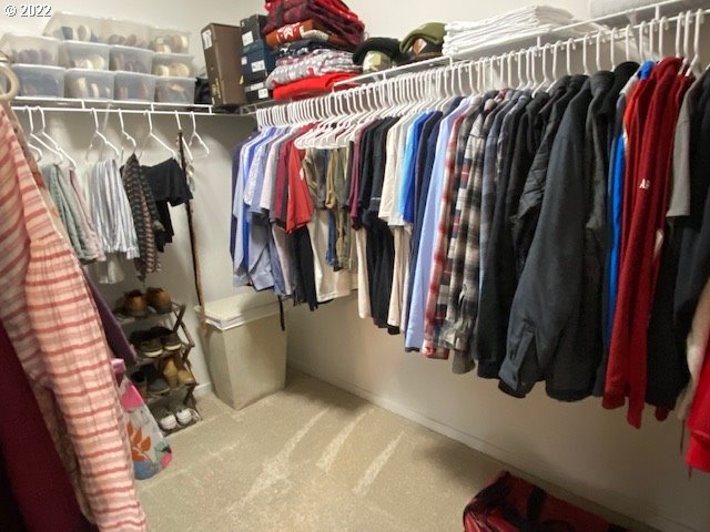 2018 South Taverner Drive Ridgefield, WA 98642 - Photo 19 of 32 a view of walk in closet with clothes and shoes