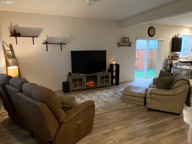 2018 South Taverner Drive Ridgefield, WA 98642 - Photo 5 of 32 a living room with furniture and a flat screen tv
