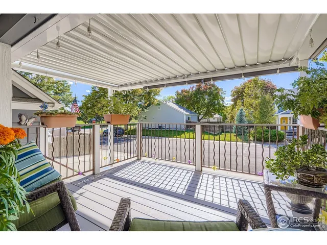 a view of outdoor space with deck and furniture