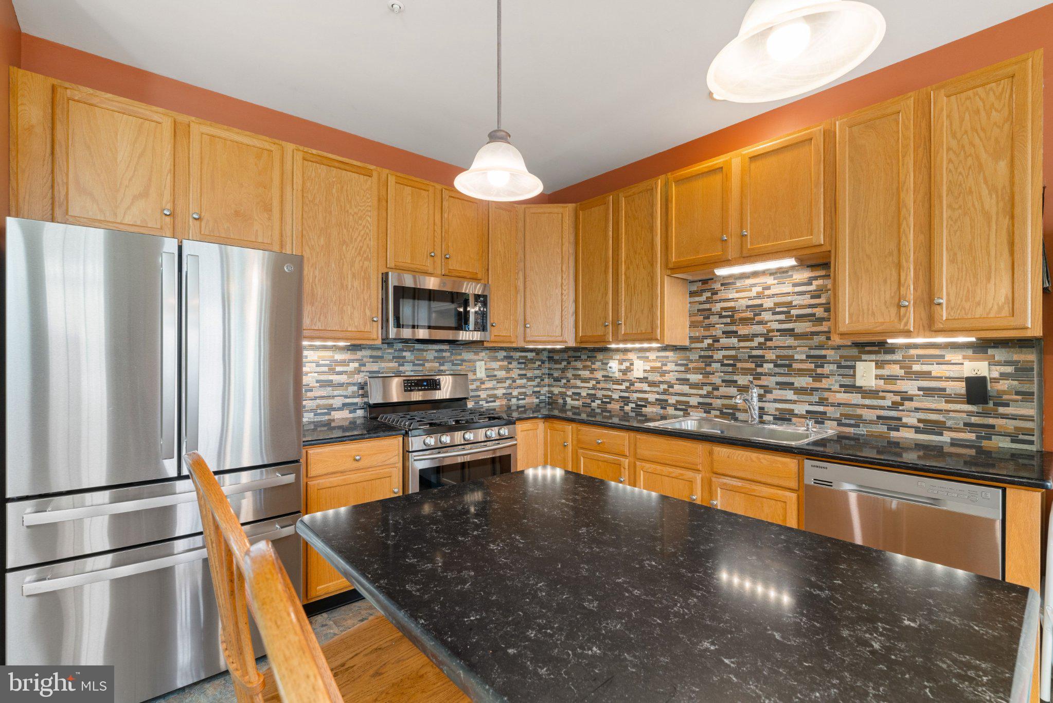 136 Sunnyhill Drive Exton, PA 19341 - Photo 7 of 37 Modern kitchen with sleek finishes.