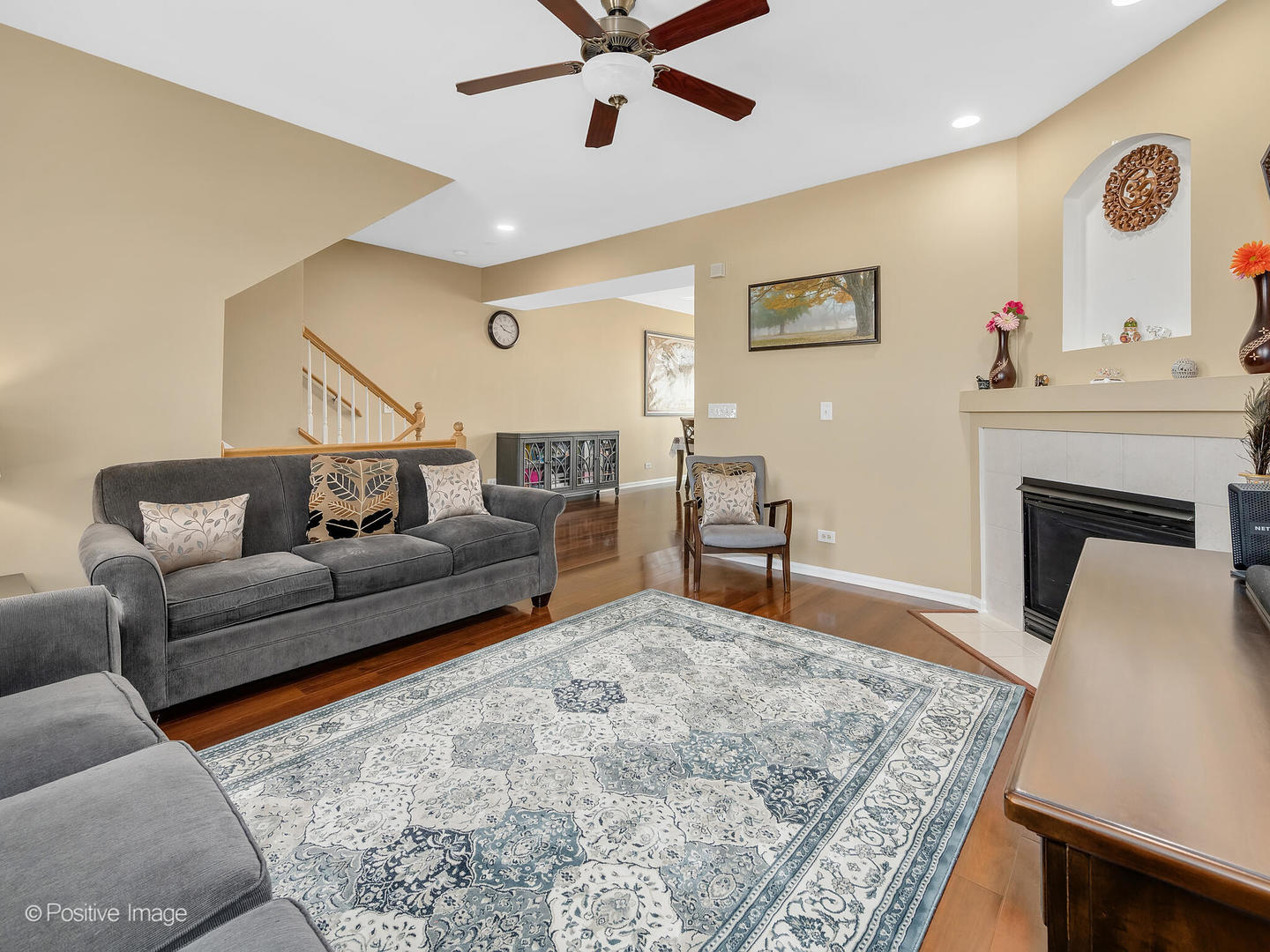 6567 Church Street Hanover Park, IL 60133 - Photo 3 of 19 a living room with furniture and a fireplace