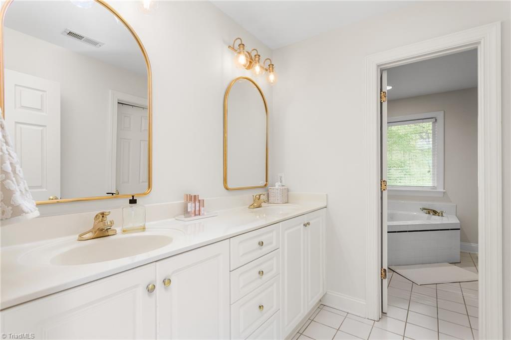 8505 Case Ridge Drive Oak Ridge, NC 27310 - Photo 13 of 35 Ensuite primary bathroom