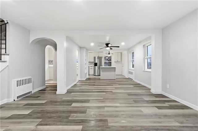 a view of a hallway to a bedroom