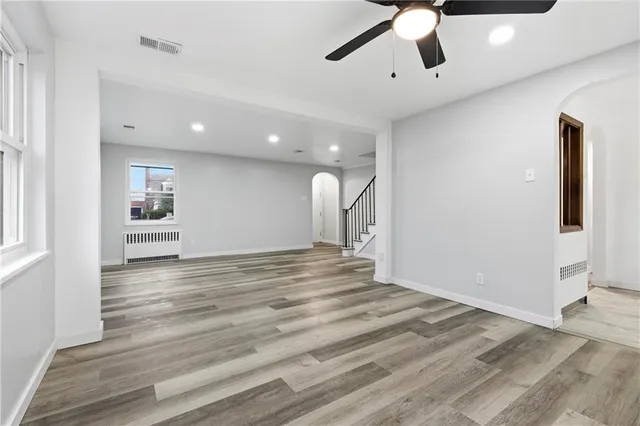 a view of a livingroom with a hardwood floor