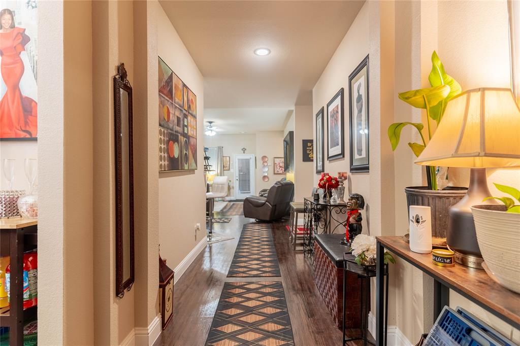 1219 Mount Olive Lane Forney, TX 75126 - Photo 2 of 12 a hallway view with two large mirror