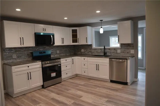 $299,000 | 322 Front Street, Grain Valley, MO 64029