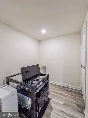 a stove top oven sitting inside of a kitchen