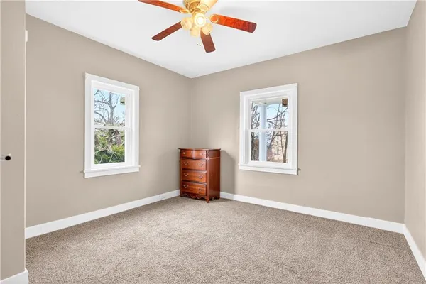 a view of a livingroom with a workspace