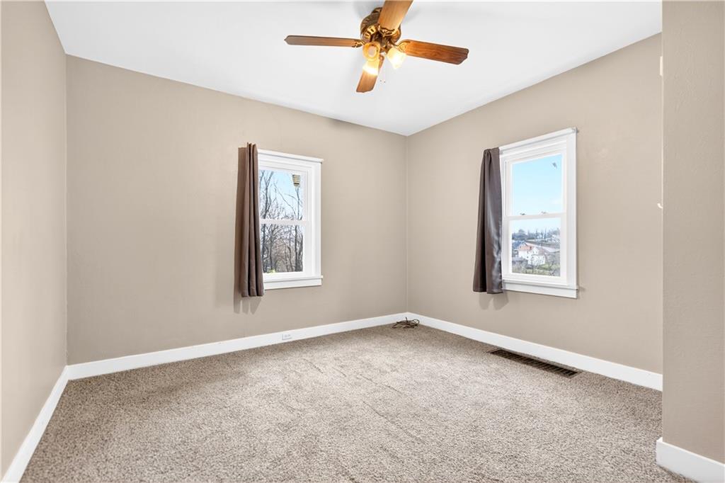 1107 Reeves Avenue Monessen, PA 15062 - Photo 22 of 33 a view of an empty room with a window
