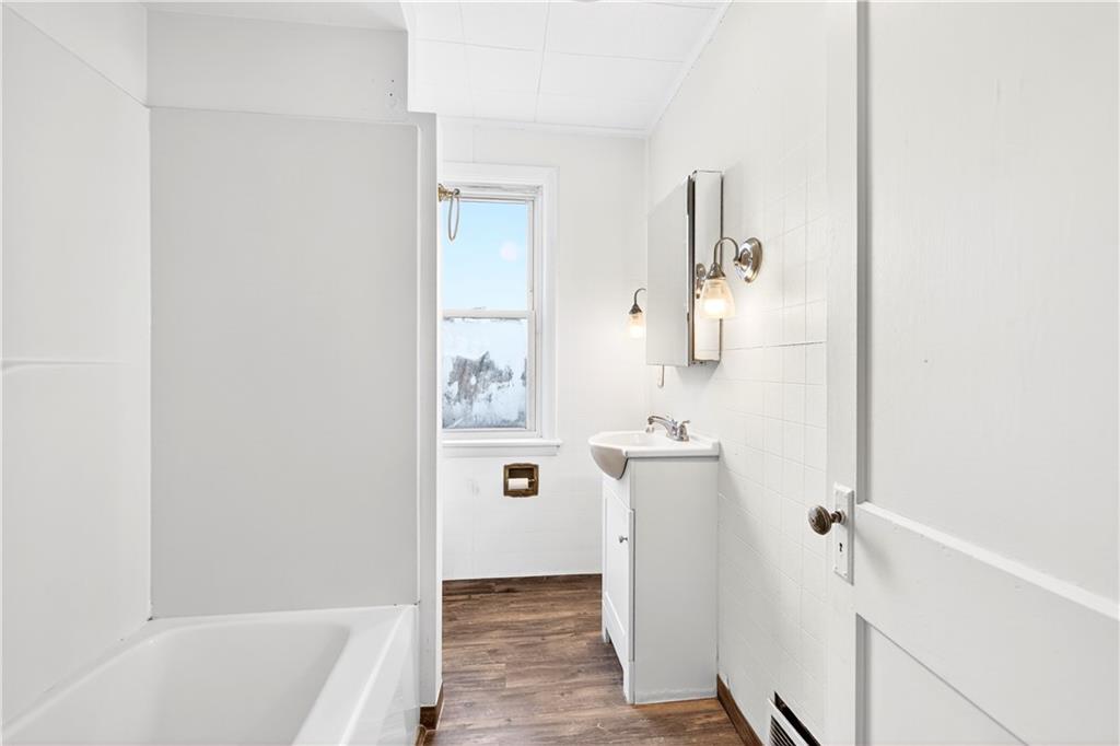 1107 Reeves Avenue Monessen, PA 15062 - Photo 23 of 33 a bathroom with a bathtub and shower