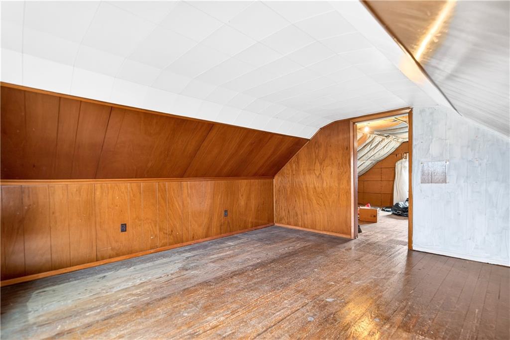 1107 Reeves Avenue Monessen, PA 15062 - Photo 27 of 33 an empty room with wooden floor