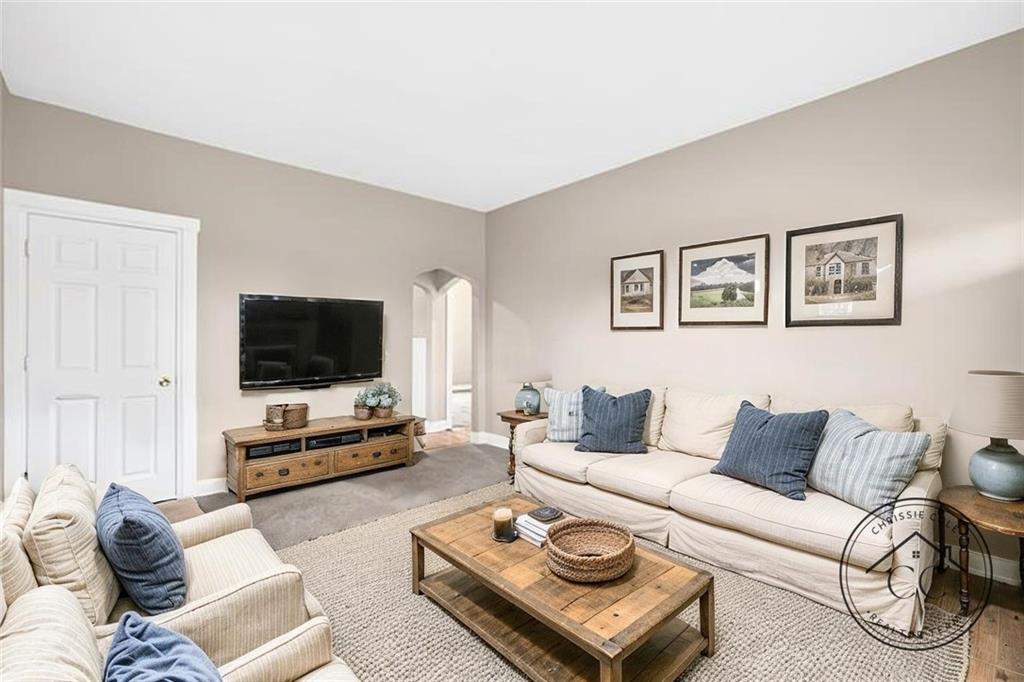 1107 Reeves Avenue Monessen, PA 15062 - Photo 7 of 33 a living room with furniture and a flat screen tv