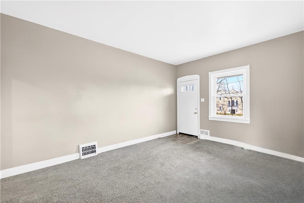 1107 Reeves Avenue Monessen, PA 15062 - Photo 9 of 33 an empty room with windows